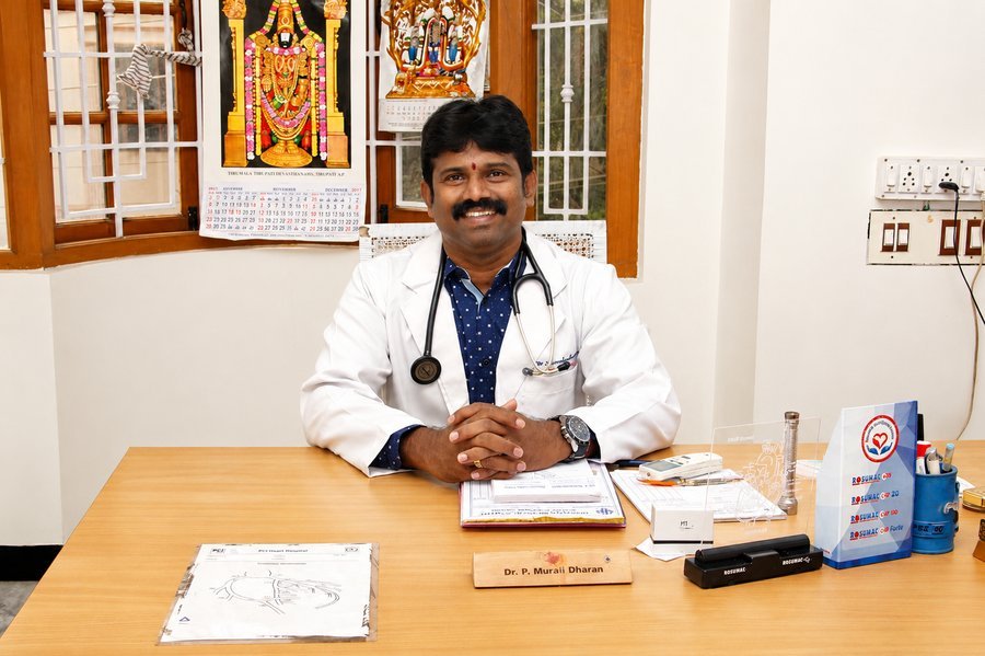 Dr. P. Muralidharan, Consultant Cardiologist at Dhanyaa Medical Centre, seated at his consultation desk